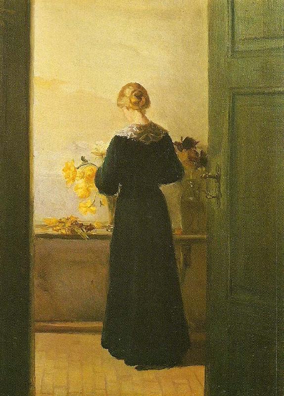 Anna Ancher en ung pige ordner blomster oil painting picture